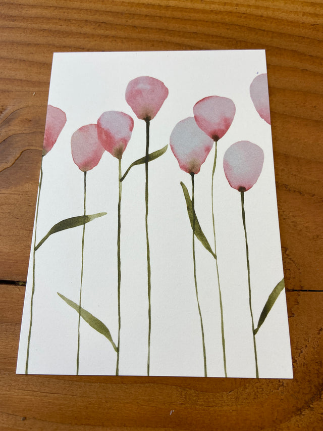 Kaartje met roze bloemen om de scheurkalender als verlovingscadeau te geven. Laat een persoonlijke boodschap in het kaartje schrijven. 